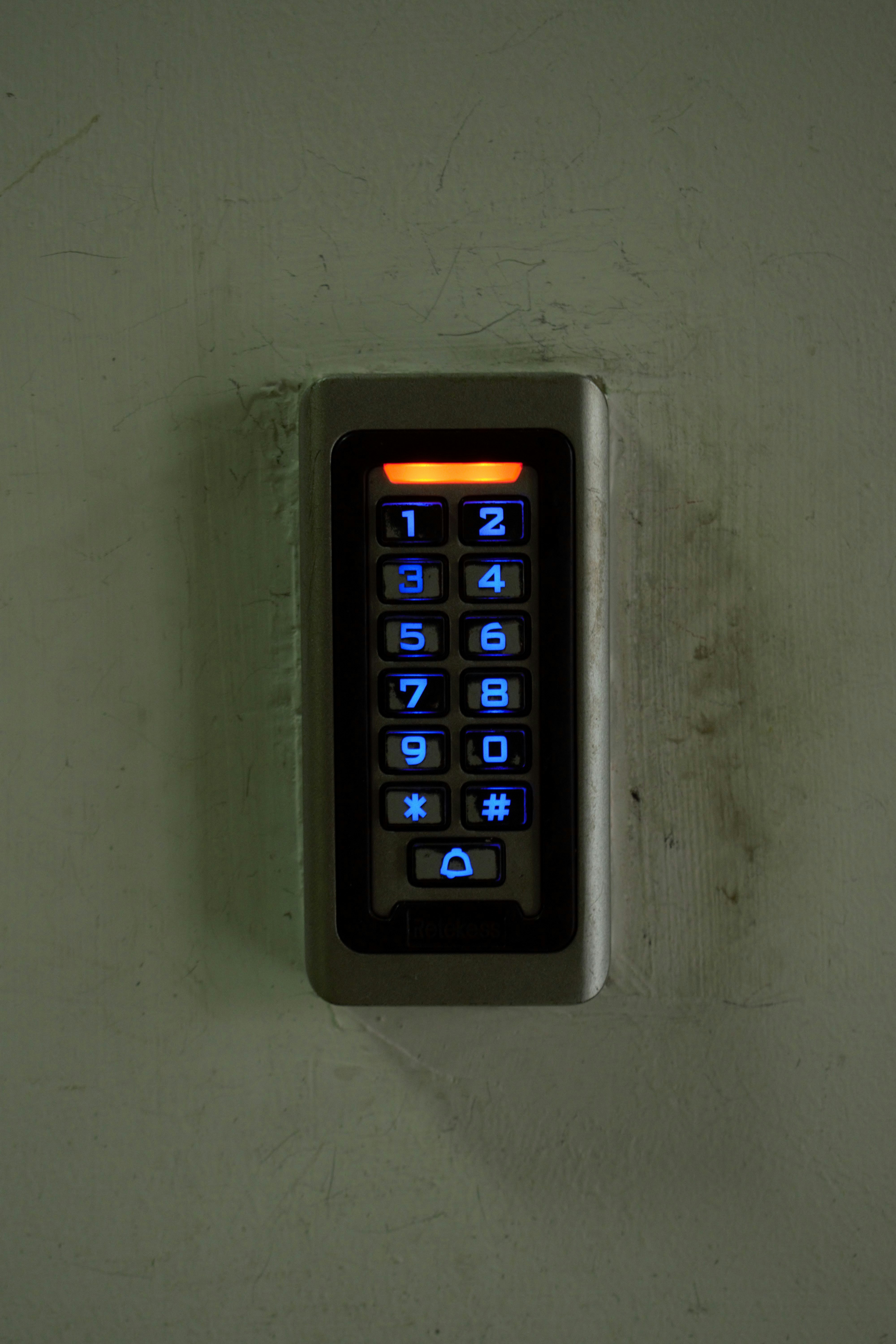 Keypad access control mounted on a wall